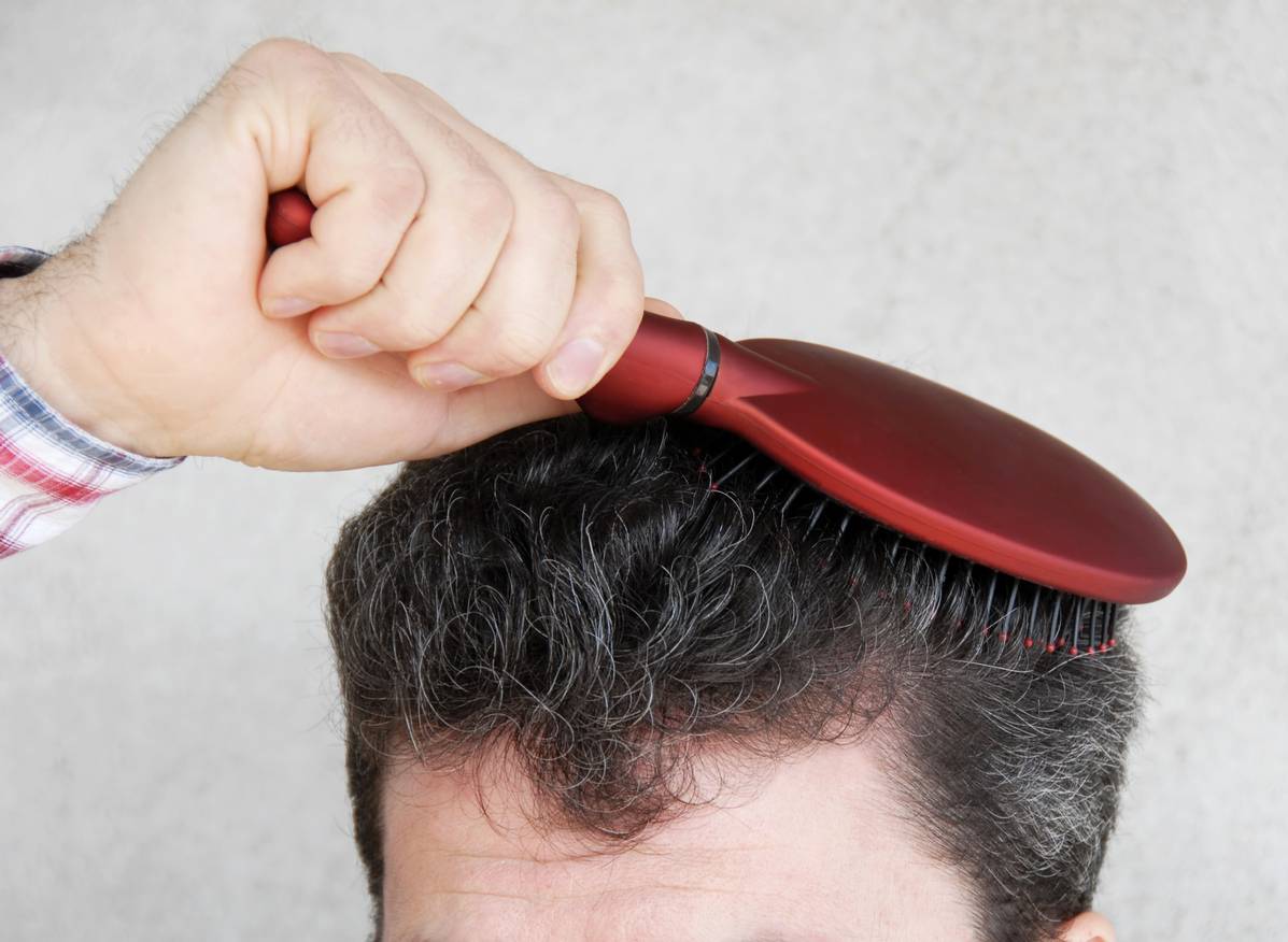 concept for man brushing hair